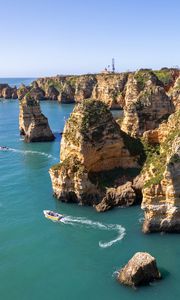 Preview wallpaper sea, rocks, mountains, boat, nature