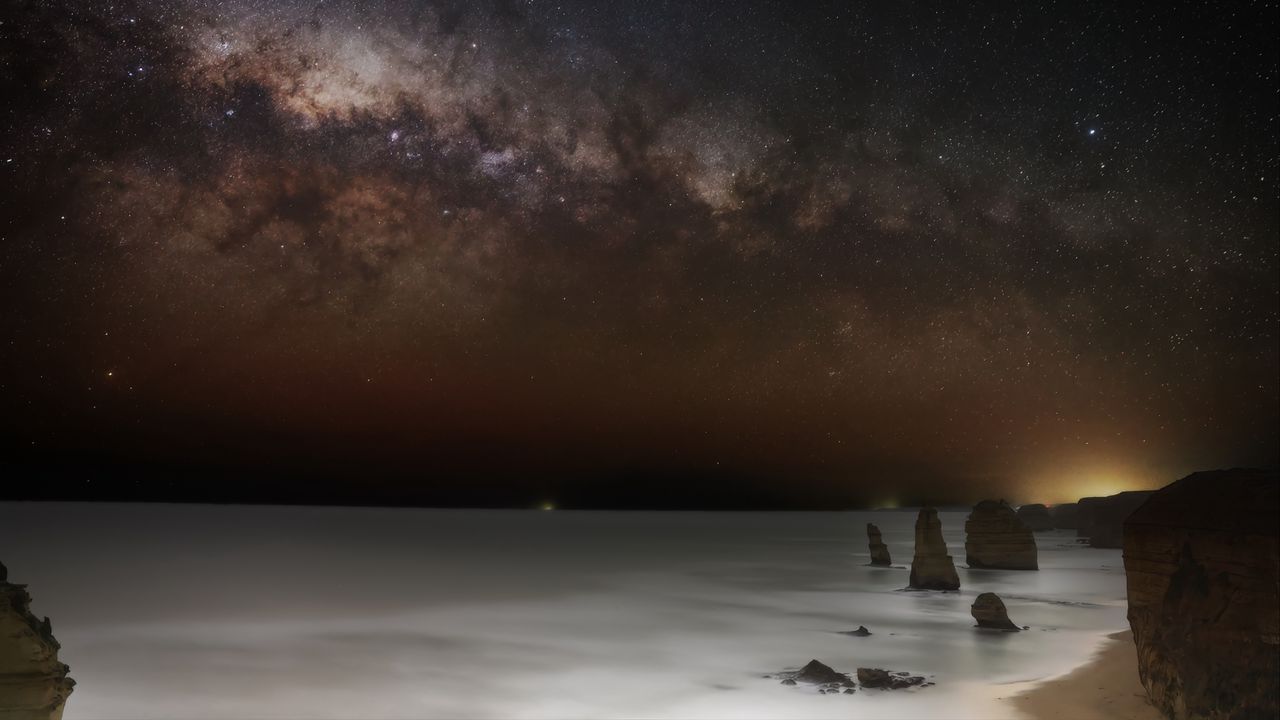 Wallpaper sea, rocks, stars, starry sky, dark