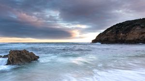 Preview wallpaper sea, rocks, stones, horizon, blur, sky