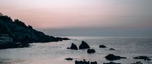 Preview wallpaper sea, rocks, stones, twilight, evening
