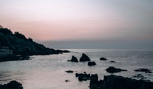 Preview wallpaper sea, rocks, stones, twilight, evening