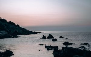 Preview wallpaper sea, rocks, stones, twilight, evening