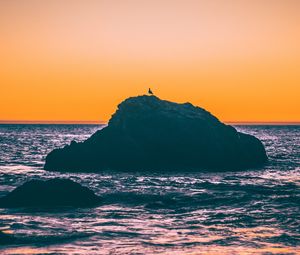 Preview wallpaper sea, rocks, sunset, dusk, waves
