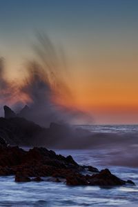 Preview wallpaper sea, rocks, surf, waves, sunset