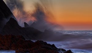 Preview wallpaper sea, rocks, surf, waves, sunset