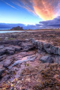 Preview wallpaper sea, rocky shore, sunset, landscape