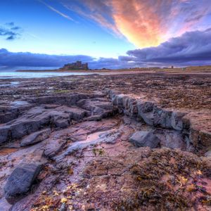 Preview wallpaper sea, rocky shore, sunset, landscape