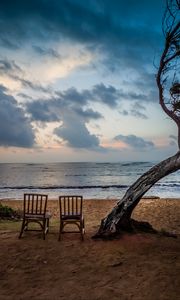 Preview wallpaper sea, shore, chairs, view, twilight, landscape