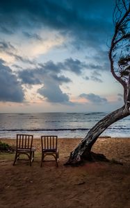 Preview wallpaper sea, shore, chairs, view, twilight, landscape