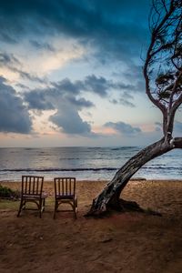 Preview wallpaper sea, shore, chairs, view, twilight, landscape