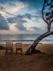 Preview wallpaper sea, shore, chairs, view, twilight, landscape