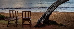 Preview wallpaper sea, shore, chairs, view, twilight, landscape