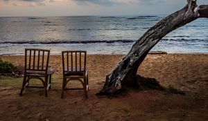 Preview wallpaper sea, shore, chairs, view, twilight, landscape