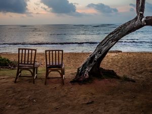 Preview wallpaper sea, shore, chairs, view, twilight, landscape