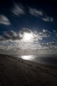 Preview wallpaper sea, shore, night, clouds, starry sky