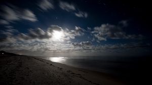 Preview wallpaper sea, shore, night, clouds, starry sky
