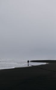 Preview wallpaper sea, silhouette, loneliness, lonely, surf