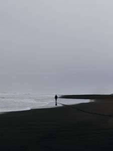 Preview wallpaper sea, silhouette, loneliness, lonely, surf