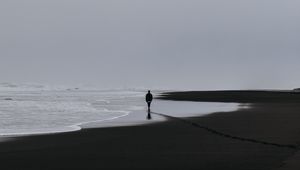 Preview wallpaper sea, silhouette, loneliness, lonely, surf