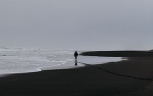 Preview wallpaper sea, silhouette, loneliness, lonely, surf