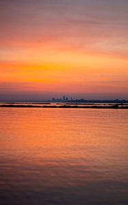 Preview wallpaper sea, silhouettes, city, evening