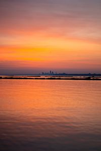 Preview wallpaper sea, silhouettes, city, evening