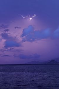 Preview wallpaper sea, sky, lightning, mountains, landscape, nature