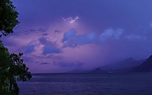 Preview wallpaper sea, sky, lightning, mountains, landscape, nature