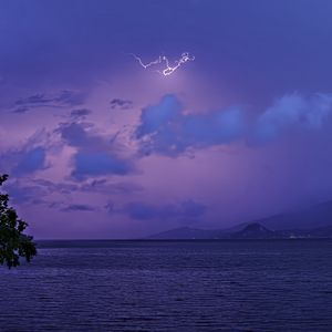 Preview wallpaper sea, sky, lightning, mountains, landscape, nature