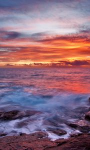 Preview wallpaper sea, sky, sunset, clouds, rocks, surf