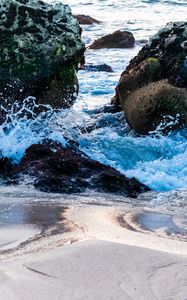 Preview wallpaper sea, splashes, stones, sand