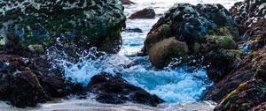 Preview wallpaper sea, splashes, stones, sand