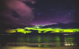 Preview wallpaper sea, starry sky, shore, sunset, radiance