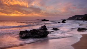 Preview wallpaper sea, stone, waves, coast, horizon, sunset