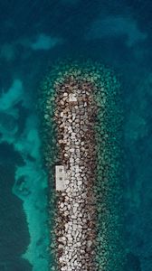 Preview wallpaper sea, stones, aerial view, breakwater, water