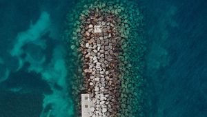 Preview wallpaper sea, stones, aerial view, breakwater, water