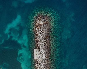 Preview wallpaper sea, stones, aerial view, breakwater, water