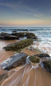 Preview wallpaper sea, stones, beach, horizon, tide