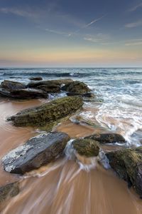 Preview wallpaper sea, stones, beach, horizon, tide