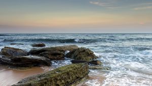 Preview wallpaper sea, stones, beach, horizon, tide