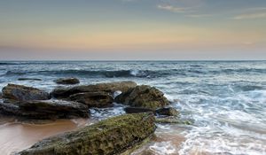 Preview wallpaper sea, stones, beach, horizon, tide