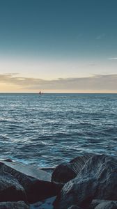 Preview wallpaper sea, stones, boat, horizon