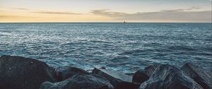 Preview wallpaper sea, stones, boat, horizon