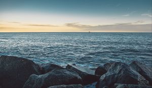 Preview wallpaper sea, stones, boat, horizon