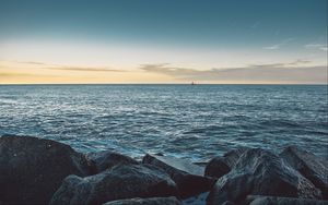 Preview wallpaper sea, stones, boat, horizon