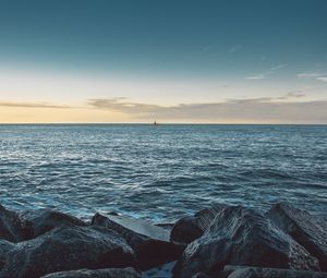 Preview wallpaper sea, stones, boat, horizon