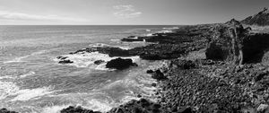 Preview wallpaper sea, stones, coast, black and white, nature