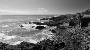 Preview wallpaper sea, stones, coast, black and white, nature