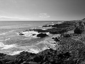 Preview wallpaper sea, stones, coast, black and white, nature