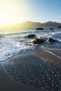 Preview wallpaper sea, stones, day, bridge, movement, stream, foam